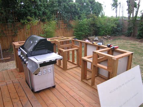 How to Build an Outdoor Kitchen on a Budget: Why Not Add a Fire Pit for Midnight Snacks?